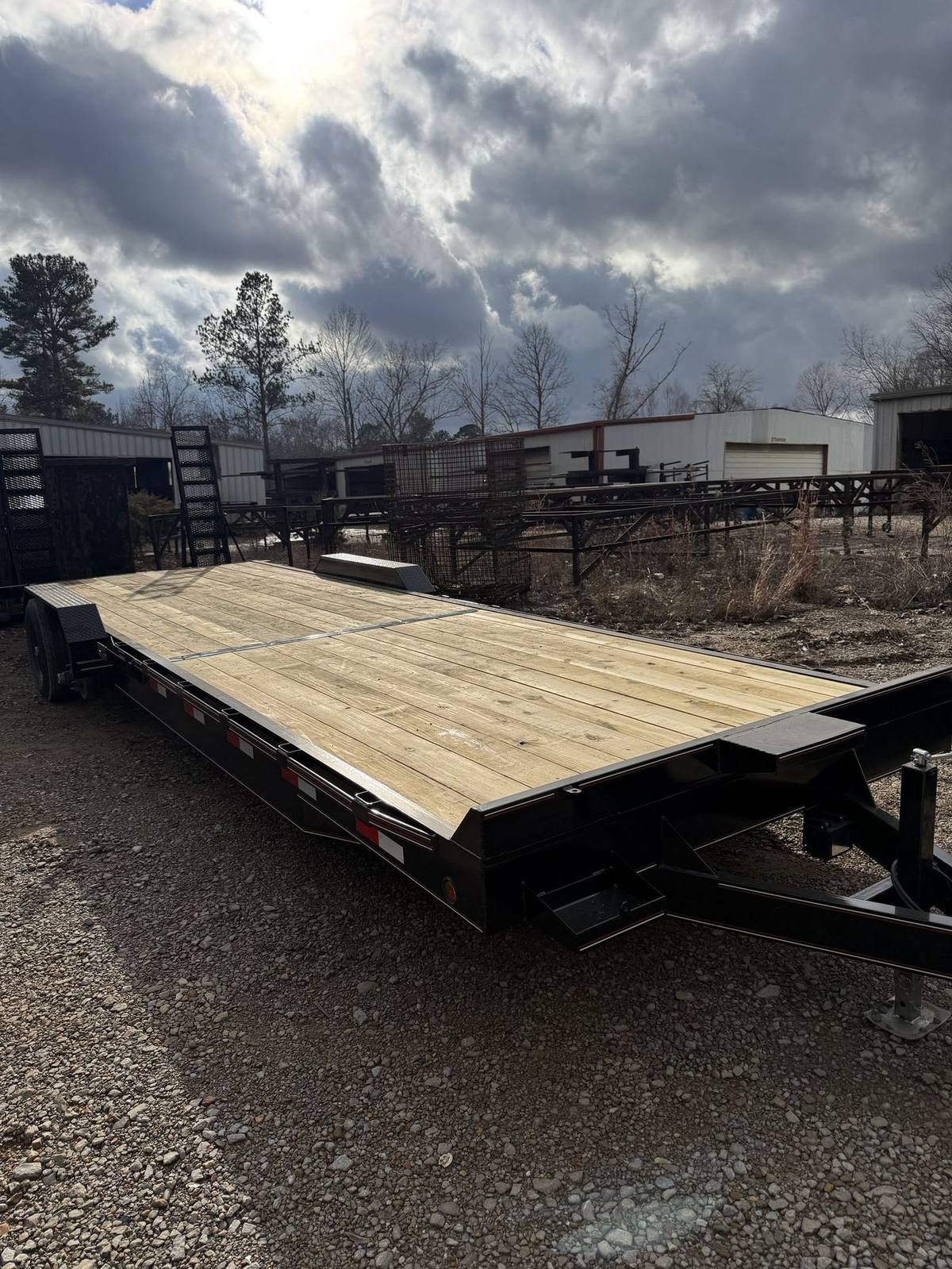 Triple R long deck equipment trailer with dovetail