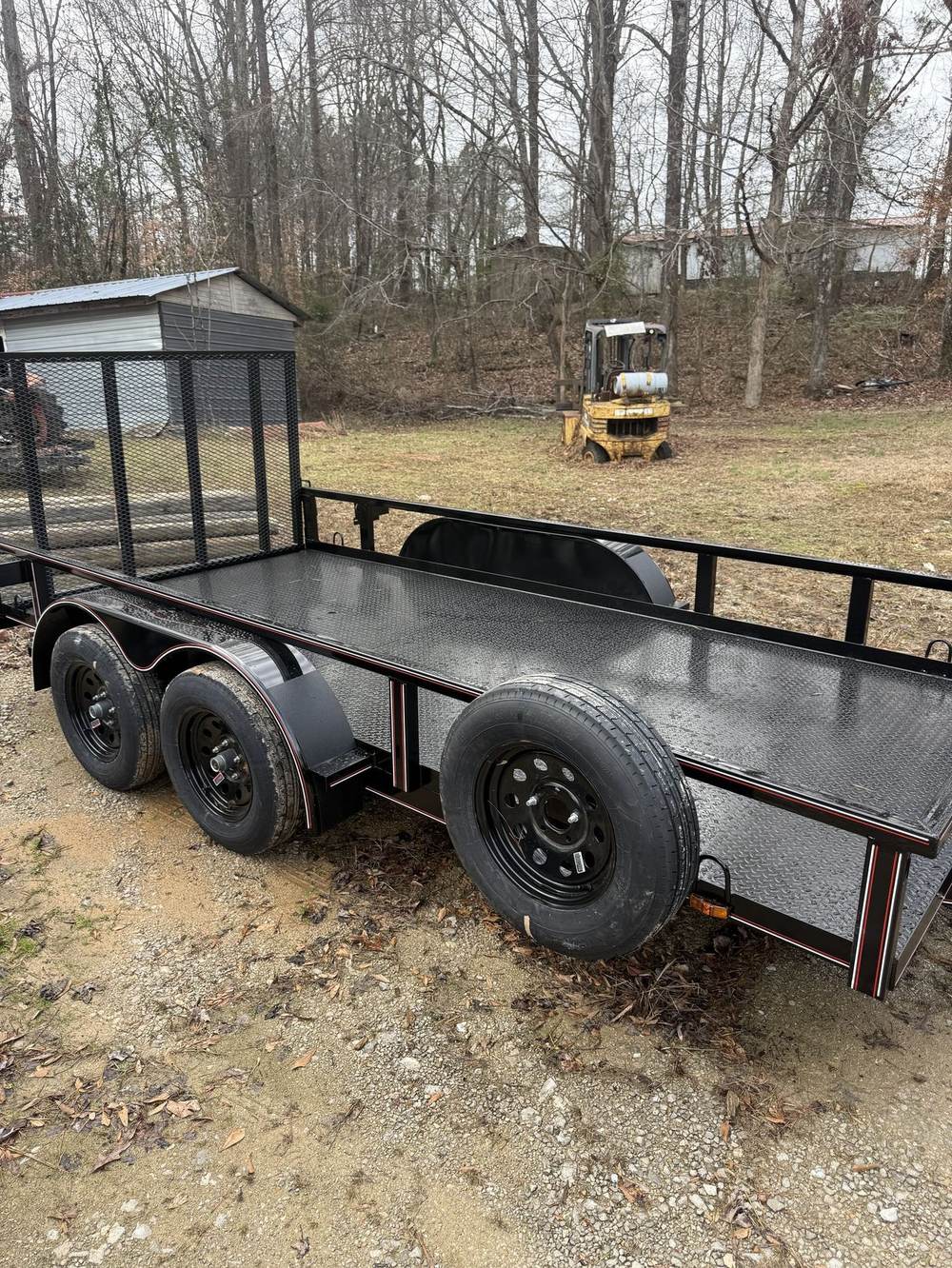 Triple axle Triple R utility trailer with steel floor